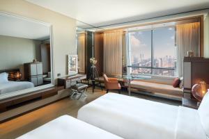 Paramount Hotel Dubai客房内的一张或多张床位