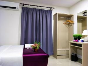 吉隆坡中央城市酒店客房内的一张或多张床位