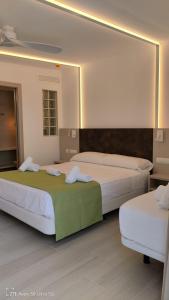 罗卡贝拉酒店客房内的一张或多张床位
