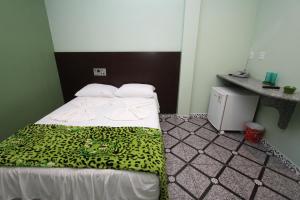 拉戈阿酒店客房内的一张或多张床位