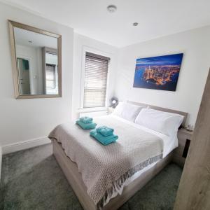 Bournemouth Luxury Apartment客房内的一张或多张床位