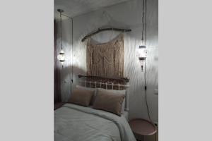 Σύγχρονο Vintage στο Μαρούσι客房内的一张或多张床位