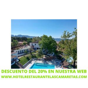 科尔特斯德拉夫龙特拉Hotel Rural & Restaurante Las Camaretas的游泳池别墅的图象