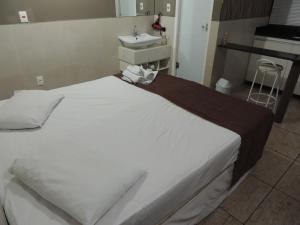 Hotel BH Inn Palmares - By UP Hotel - Acesso Cristiano Machado客房内的一张或多张床位