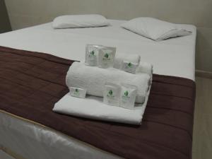 Hotel BH Inn Palmares - By UP Hotel - Acesso Cristiano Machado客房内的一张或多张床位