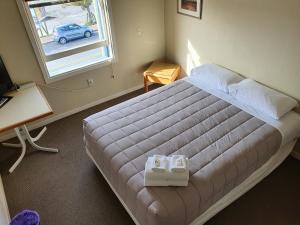 Fernlodge Inglewood客房内的一张或多张床位