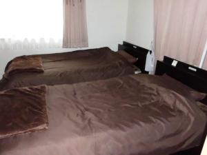马里亚热私人住宅旅馆客房内的一张或多张床位
