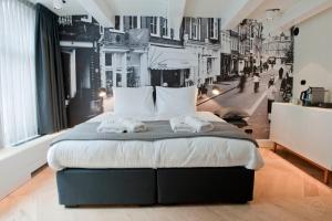 阿姆斯特丹奈恩IX号酒店客房内的一张或多张床位