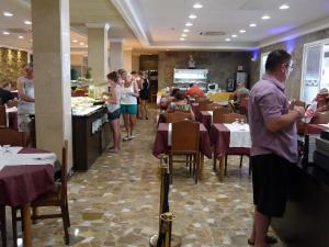 拉帕尔梅拉酒店和spa餐厅或其他用餐的地方