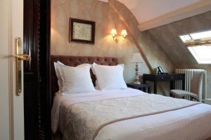 奥博热拉邦内伊德酒店客房内的一张或多张床位