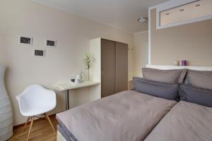 Klein & Fein, Appartement- und Zimmervermietung客房内的一张或多张床位