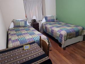 Hospedaje Milenio客房内的一张或多张床位
