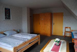 Alte Schule App1客房内的一张或多张床位