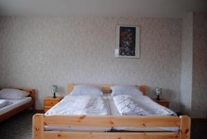 Alte Schule App1客房内的一张或多张床位