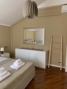 La Rocca Luxury Apartment客房内的一张或多张床位