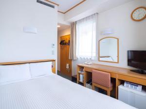 古欧莱酒店长崎站前客房内的一张或多张床位