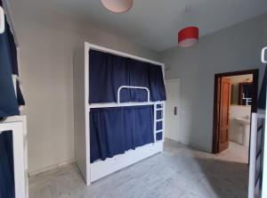 New Samay Hostel客房内的一张或多张双层床