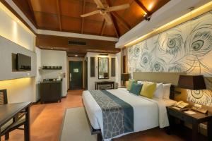 Khaolak Merlin Resort客房内的一张或多张床位