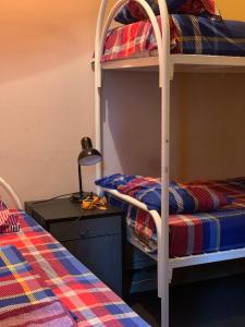 Hotel Uyut客房内的一张或多张床位