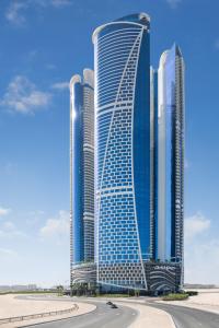 迪拜Paramount Hotel Dubai的城市高楼 ⁇ 染