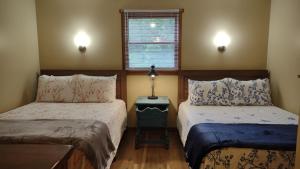 Cozy Creek Cottages客房内的一张或多张床位