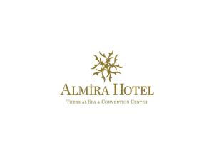 伯萨Almira Hotel Thermal Spa & Convention Center的标有大西洋酒店标志的酒店标志