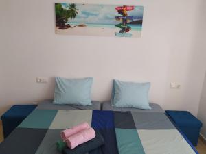 Casa de Fabian Appartment + WIFI near beach/port客房内的一张或多张床位