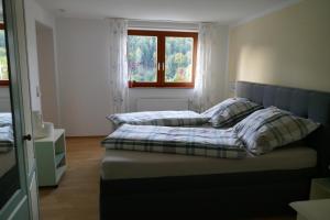 Ferienwohnung Am Wald客房内的一张或多张床位