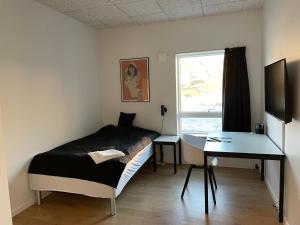 Tuukkaq Apartments客房内的一张或多张床位