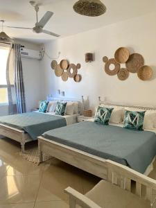 Nyali Emirates Reef Apartment客房内的一张或多张床位