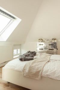 Huize Copes apartment Den Haag, 2 bed, 2 bath客房内的一张或多张床位