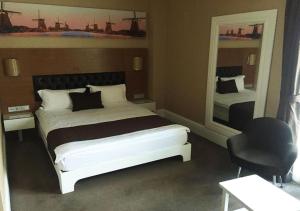 普罗夫迪夫城市酒店客房内的一张或多张床位