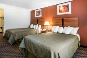 拉特兰优质酒店客房内的一张或多张床位