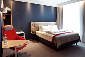 Holiday Inn Express - Recklinghausen客房内的一张或多张床位