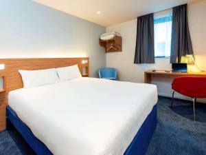 ibis budget London Bromley Town Centre客房内的一张或多张床位