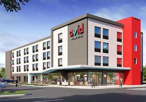 南海文avid hotels - Memphis - Southaven, an IHG Hotel的 ⁇ 染带有xo酒店的建筑