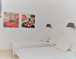 瓦伦西亚多米尔旅舍客房内的一张或多张床位