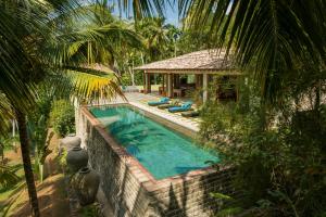 Kumara Luxury Villa内部或周边的泳池
