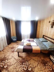 House Baikal客房内的一张或多张床位