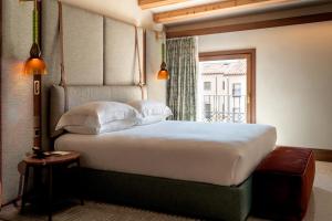 Ca'di Dio-Small Luxury Hotel客房内的一张或多张床位
