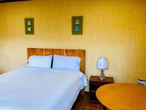 Quito Terrace客房内的一张或多张床位