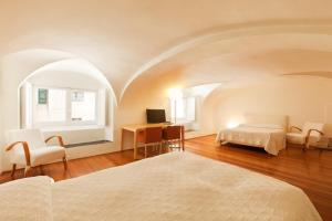 Palazzo Cicala客房内的一张或多张床位