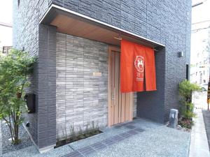 京都ShukuShuku的一面挂着红旗