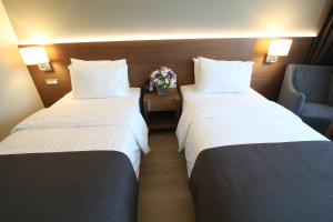 布尔萨市中心假日酒店客房内的一张或多张床位