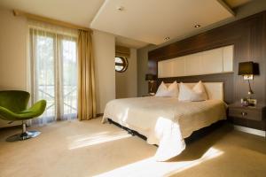 多瑙花园酒店客房内的一张或多张床位