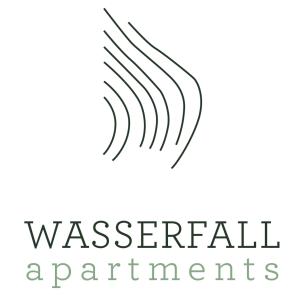 梅劳Wasserfall Apartments Mellau的用于室性组织的黑白标志