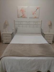 Castella Aquae estudio客房内的一张或多张床位