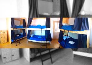 迈普OliWine hostel的客房内的一组双层床