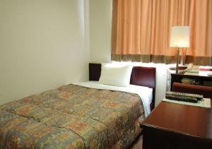 卡酷班酒店客房内的一张或多张床位