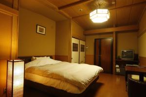 旬彩月之静香日式旅馆客房内的一张或多张床位
